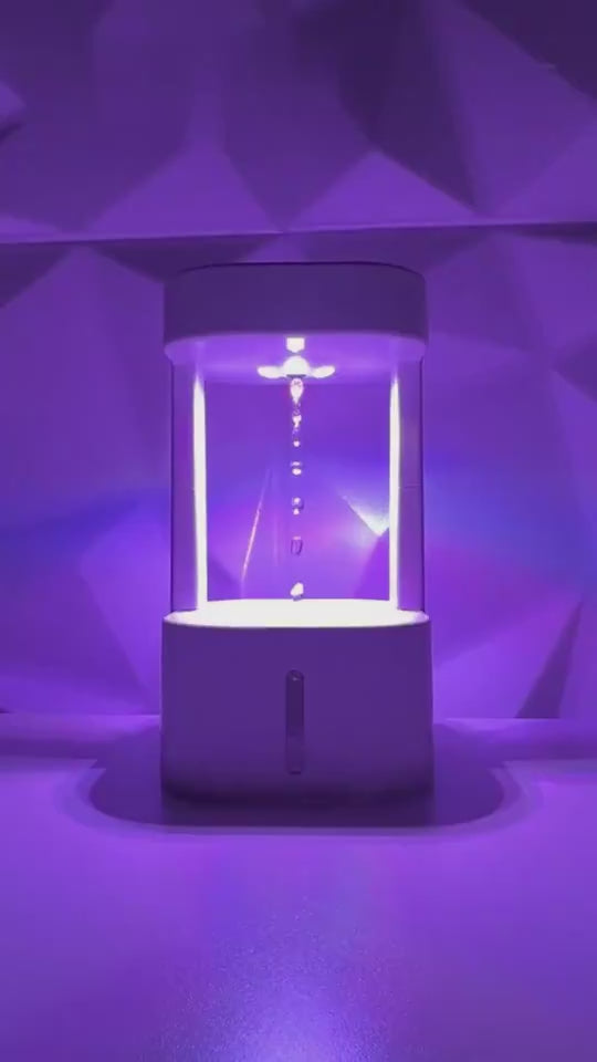 dimostrazione umidificatore antigravità funzione goccia acqua levitante nebulizzazione silenziosa